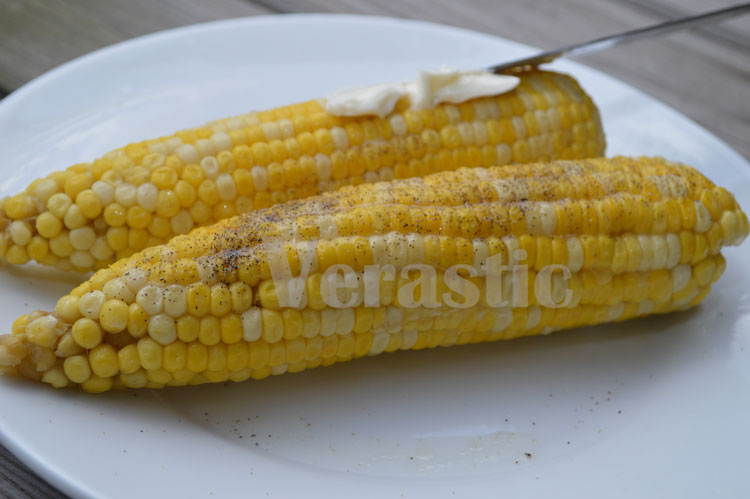 Corn on the cob, black pepper, and LAND O LAKES Butter